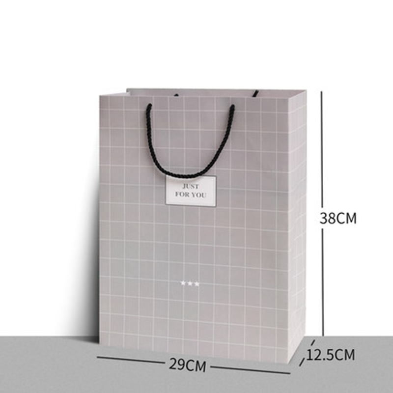 Wholesale luxury custom printed paper gift shopping retail bags with logo and handles