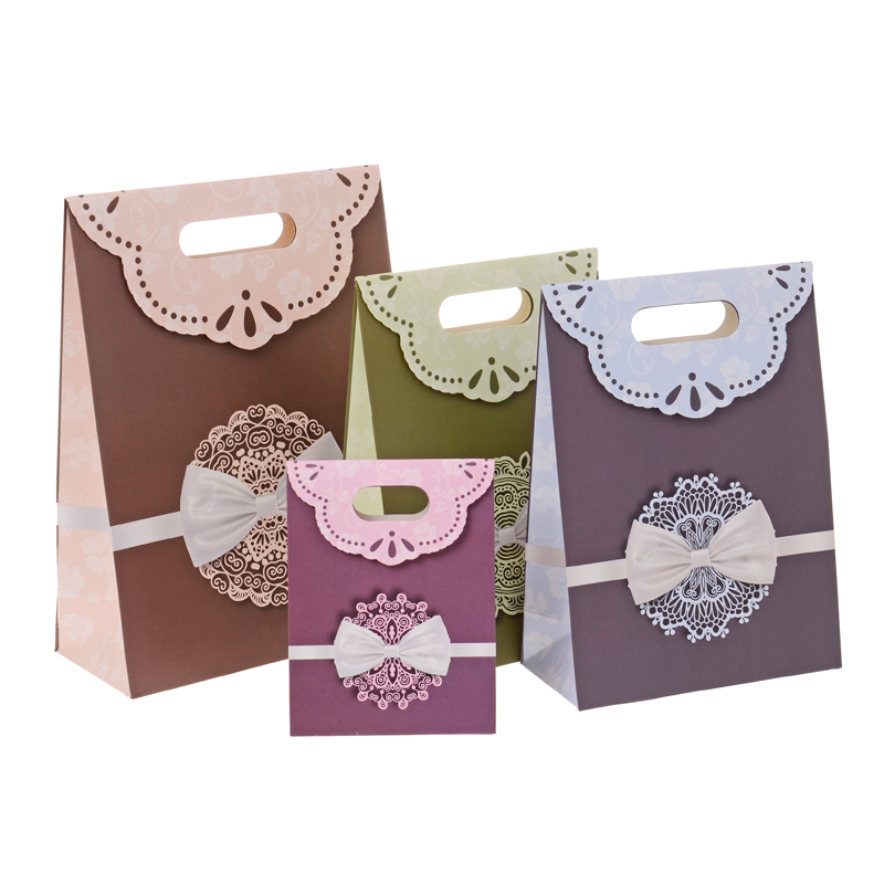 Shopping package foldable paper gift bag with ribbon bow