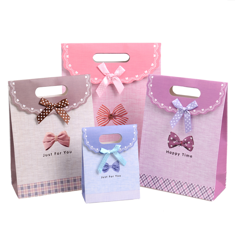 China wholesale decorative luxury recyclable fashion gift paper bags with your own logo