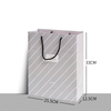 Wholesale luxury custom printed paper gift shopping retail bags with logo and handles