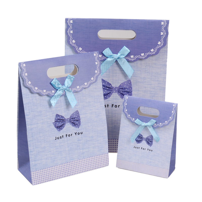 China wholesale decorative luxury recyclable fashion gift paper bags with your own logo