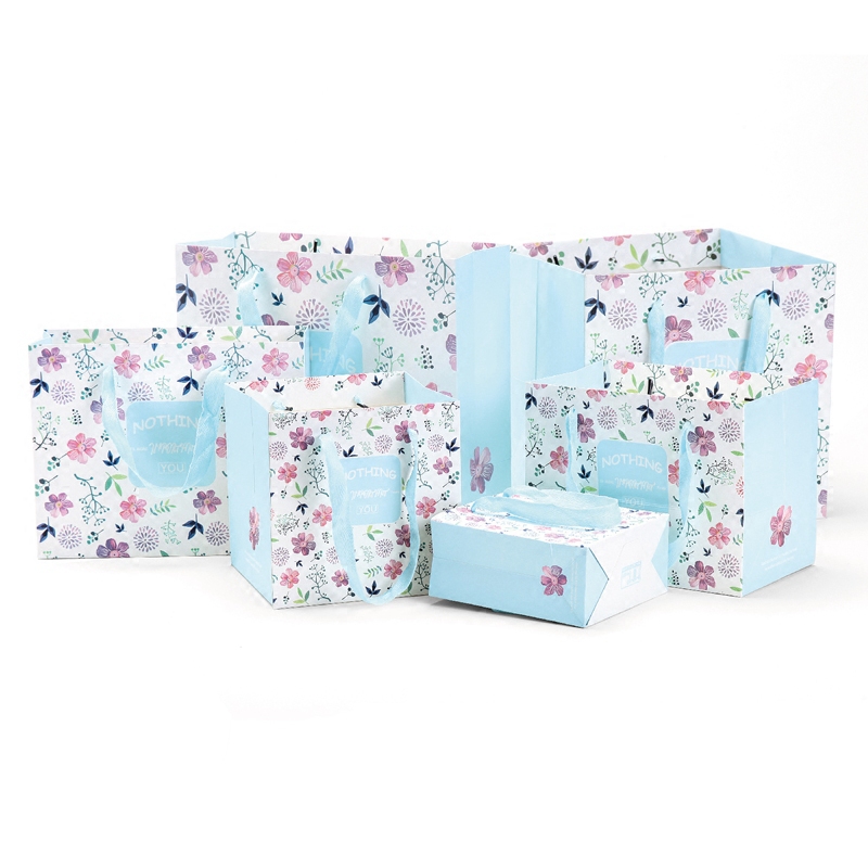 Custom design printed luxury gift packaging kraft paper carry die cut handle shopping bag with your own logo