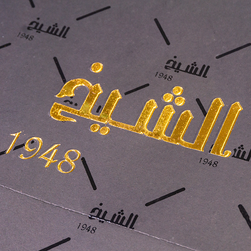 High-quality strong load-bearing gold screen printing uv craft black cardboard paper bag for bulk wholesale