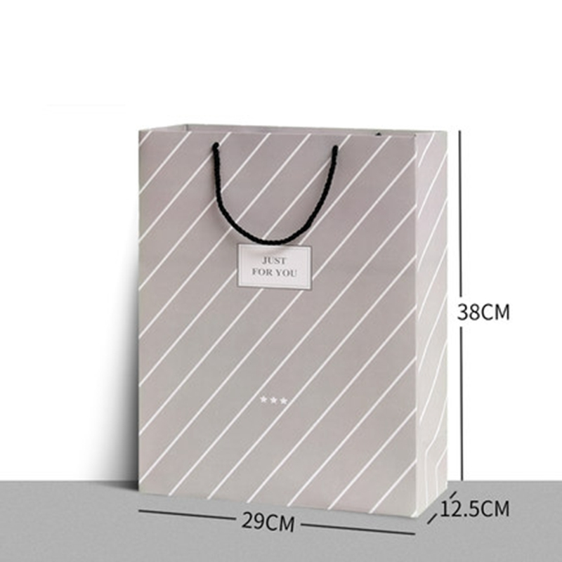 Wholesale luxury custom printed paper gift shopping retail bags with logo and handles