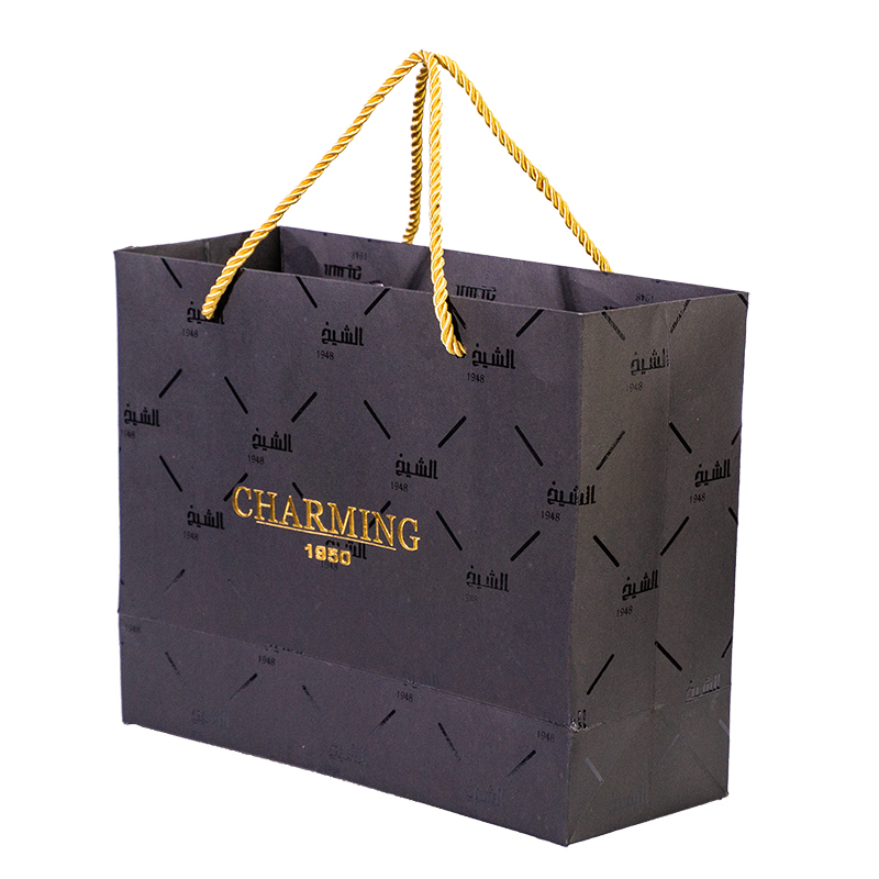 High-quality strong load-bearing gold screen printing uv craft black cardboard paper bag for bulk wholesale