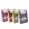 Shopping package foldable paper gift bag with ribbon bow