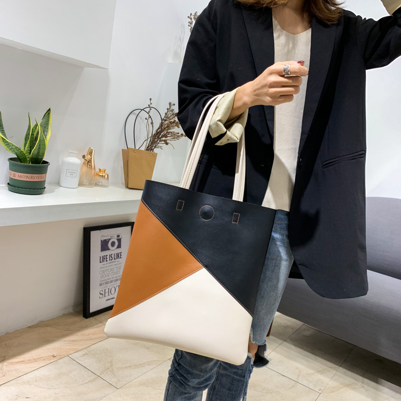 New fashion large capacity bag Korean version of the collision color shoulder bag simple atmosphere soft pu leather bag