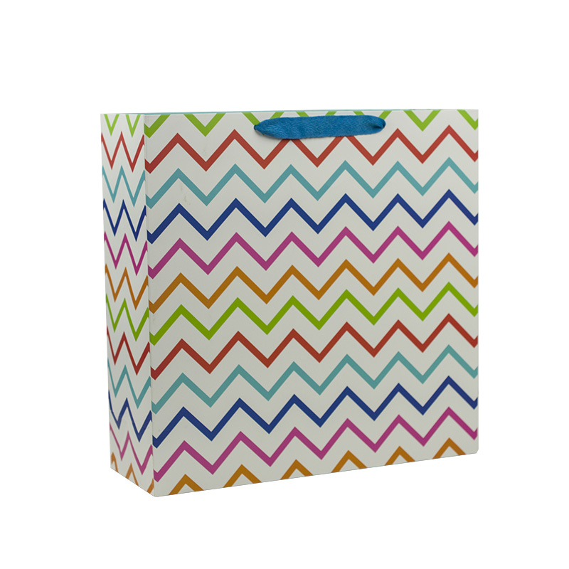 Custom design luxury gift packaging kraft paper carry die cut handle shopping bag with your own logo 