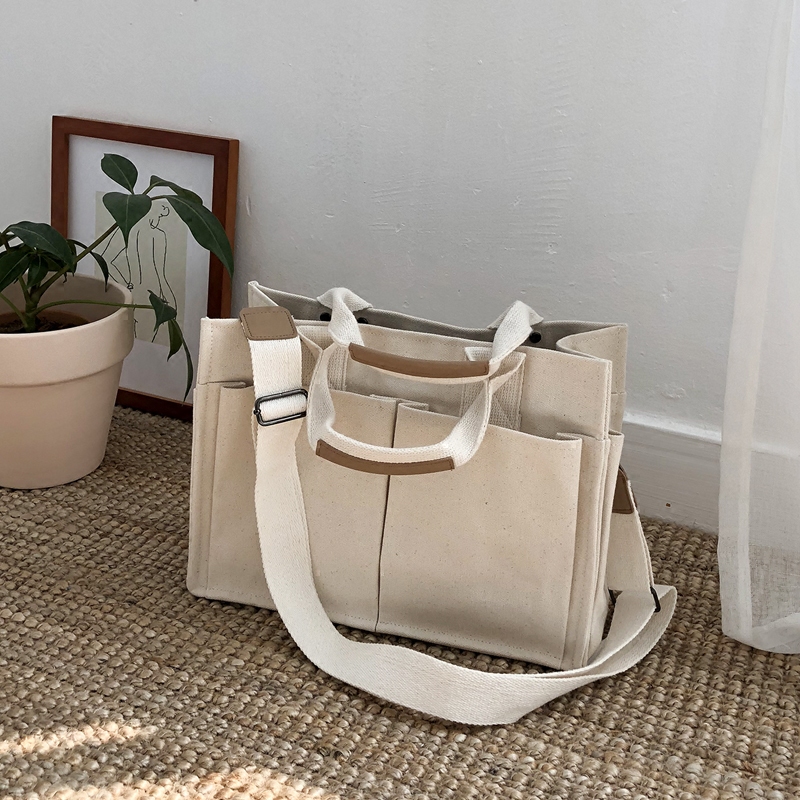 Multi-pockets white canvas tote bag for women