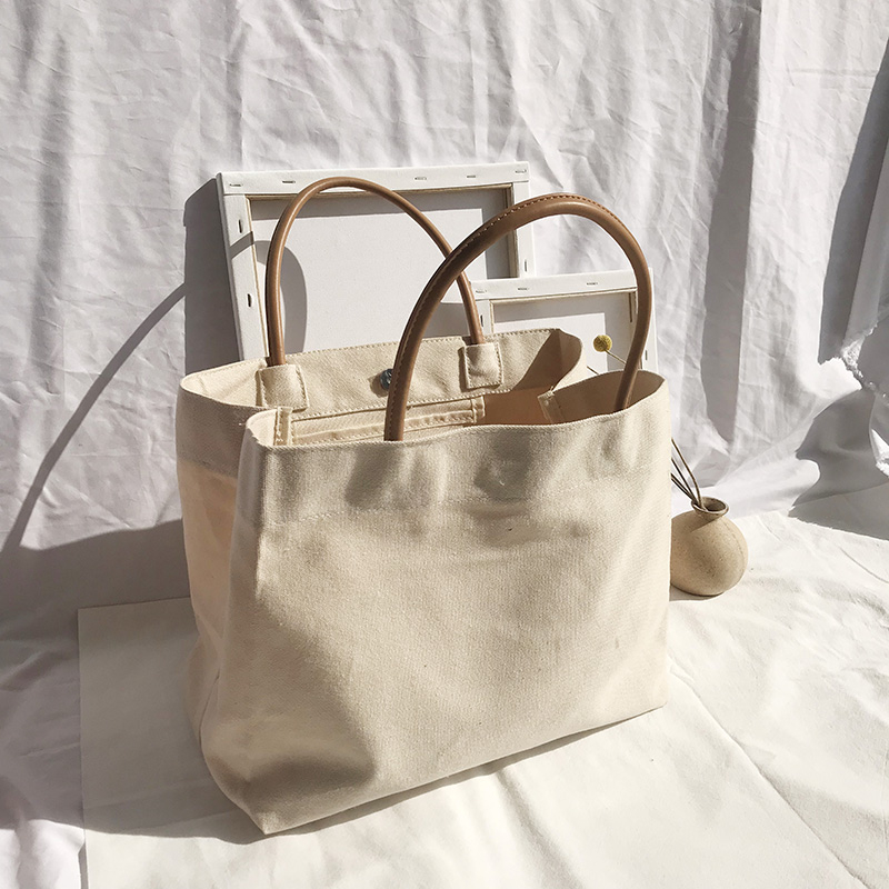 Factory direct supply customized natural color eco friendly recycled cotton canvas tote shopping bag with leather handle