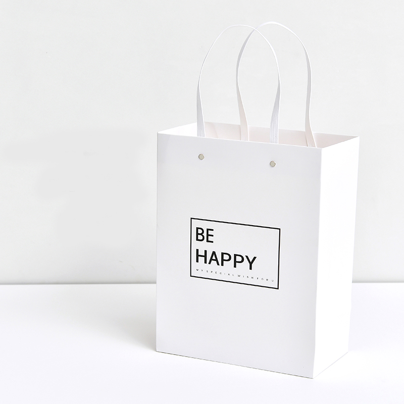 Recycled wholesale cheap brown paper bags with handles for gift packaging