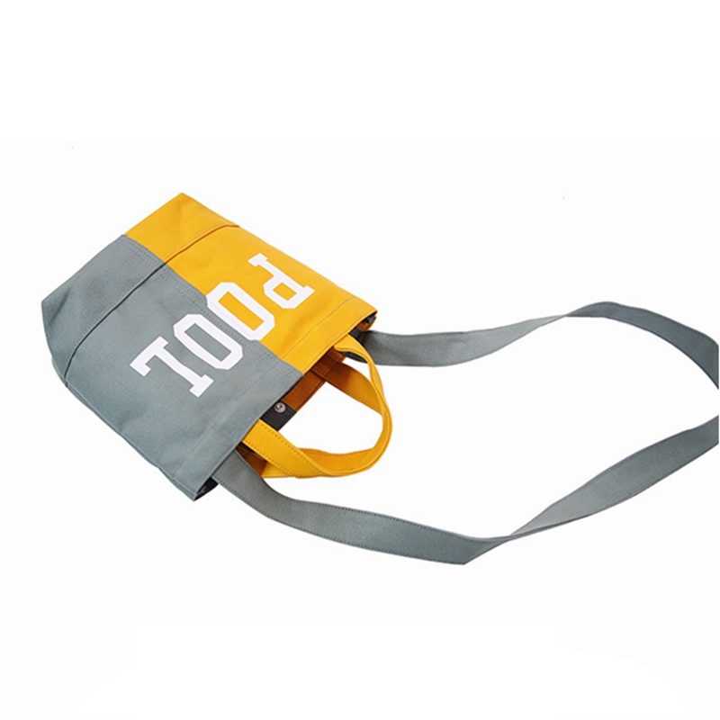 Fashion customized two-color printing stitching women canvas tote messenger bag on sale