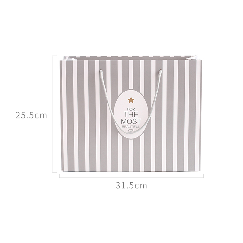 Custom different patterns and sizes gift paper bag with low price 