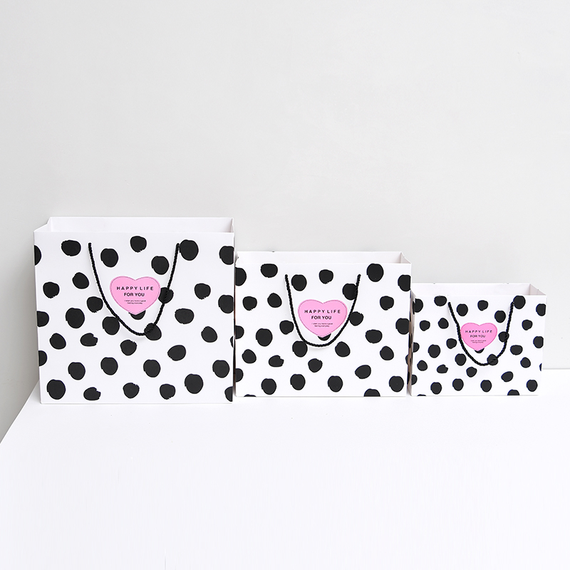 Most popular cheap custom beautiful pattern printed gift paper bag for sale