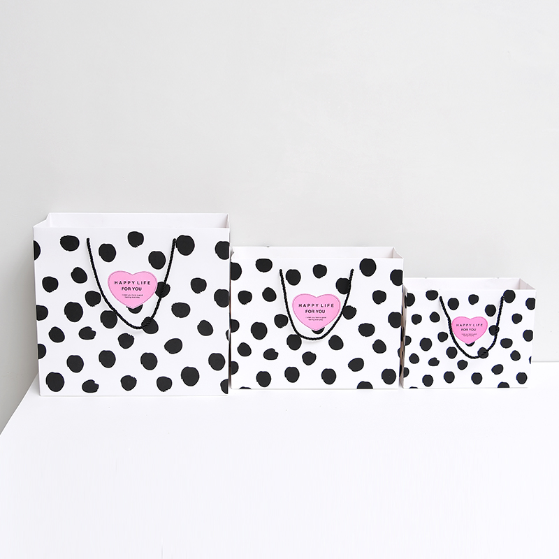 Most popular cheap custom beautiful pattern printed gift paper bag for sale