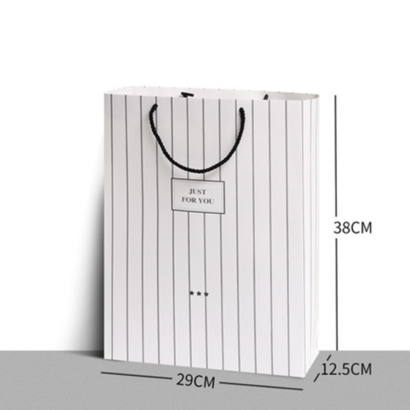 Wholesale luxury custom printed paper gift shopping retail bags with logo and handles