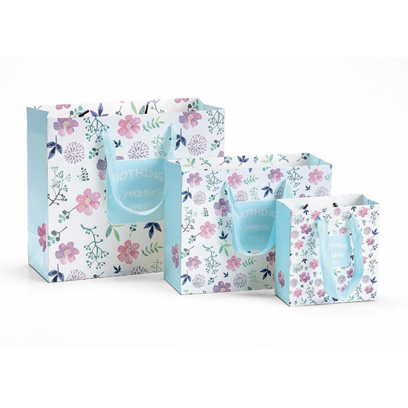 Custom design printed luxury gift packaging kraft paper carry die cut handle shopping bag with your own logo