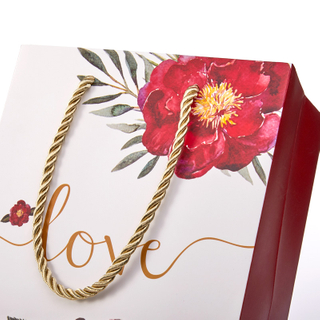 Wholesale custom packaging cardboard fancy paper gift bags with handles