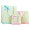 Customize different sized cheap gift art paper bag with gold hot stamping logo and ribbon