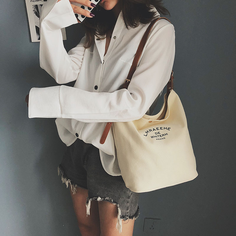 Canvas bag female single shoulder large capacity simple student bucket bag with leather strap