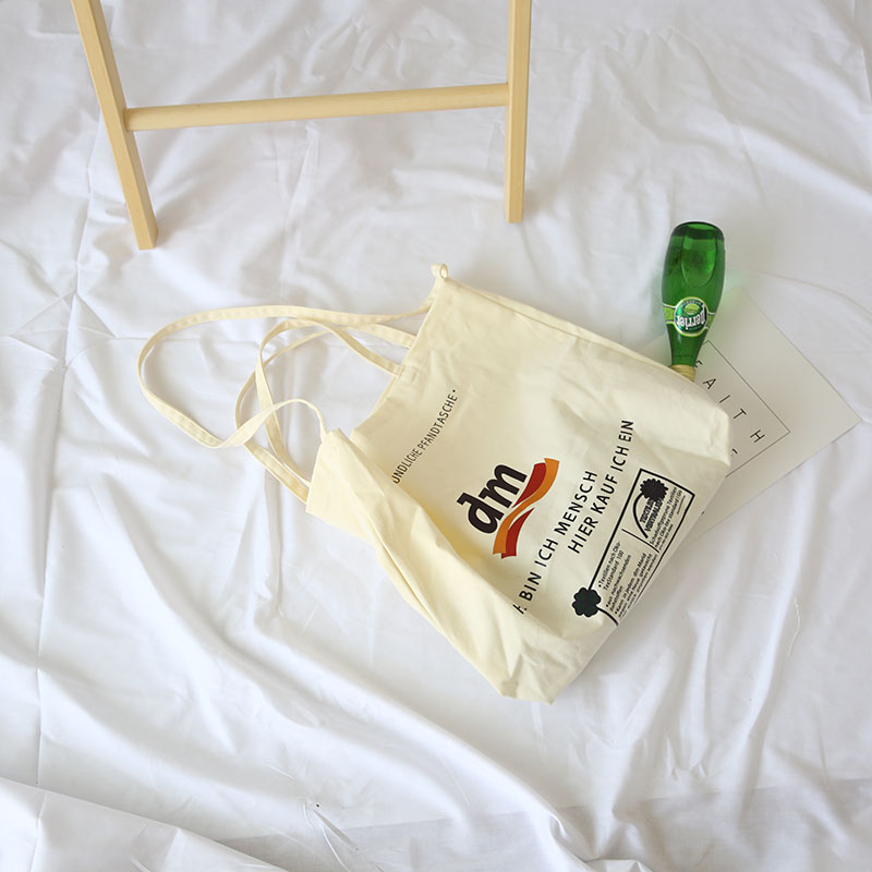 Thin breathable fashion letter printing large capacity canvas messenger bag with zipper inner pockets